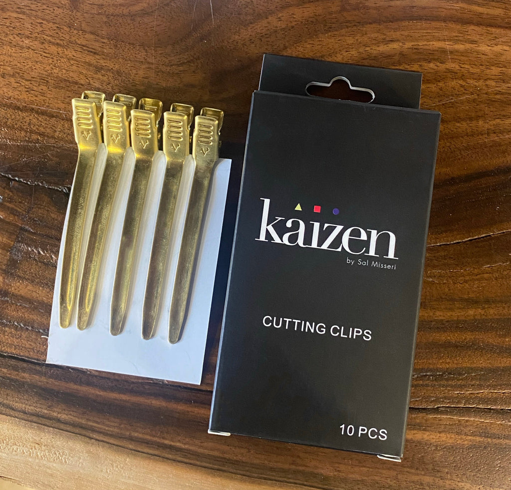 a set of 10 gold cutting clips by Kaizen 